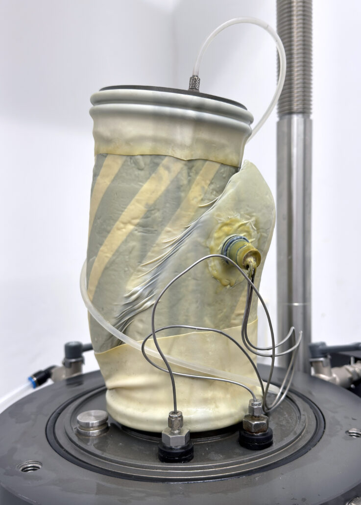 An evident shear plane observed at the end of a CIUc triaxial test on a firm clay sample.