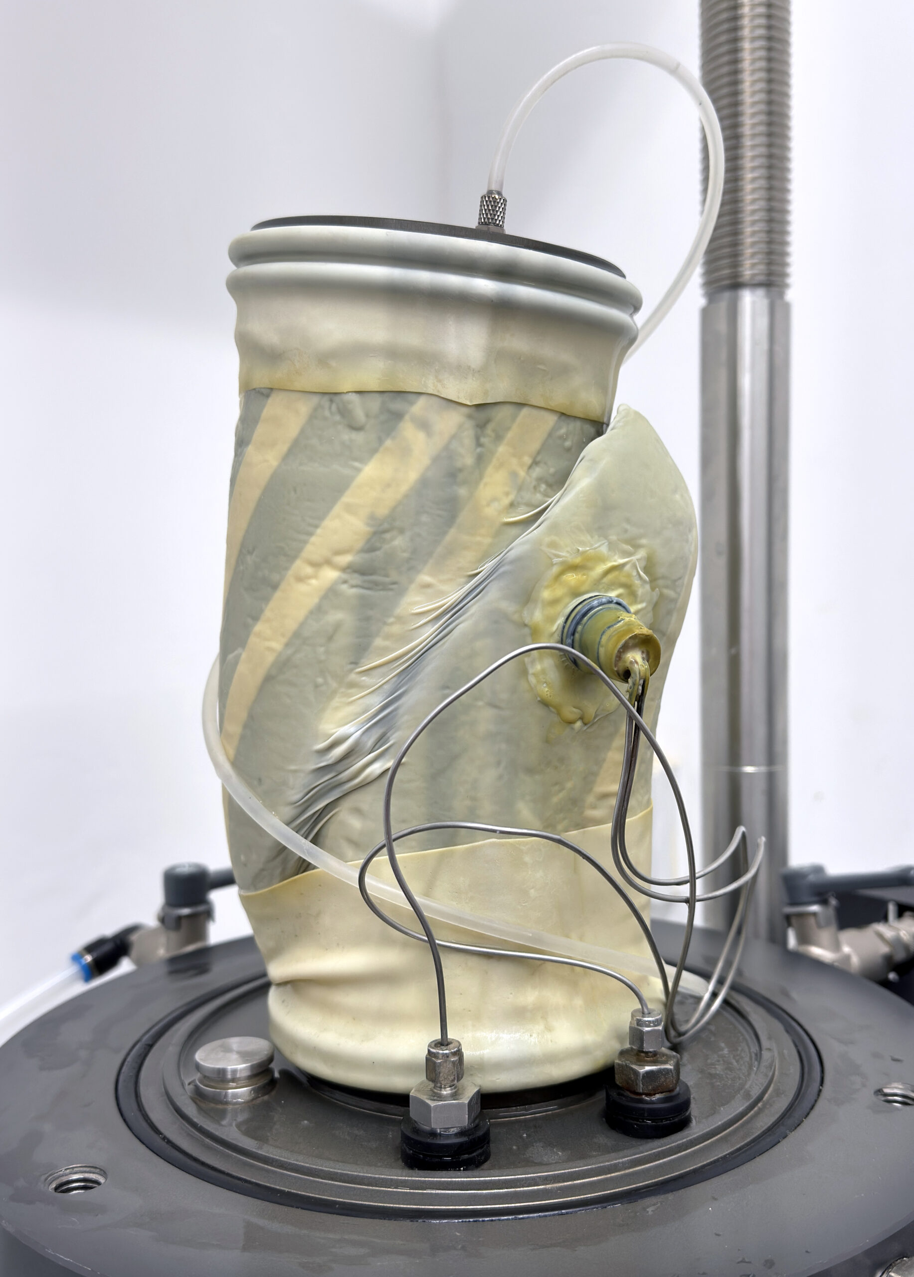 An evident shear plane observed at the end of a CIUc triaxial test on a firm clay sample.